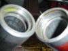 Left-pneumatic seal/wiper leg, Right-conventional 50mm oil seal leg.